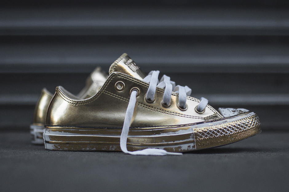 gold low top converse